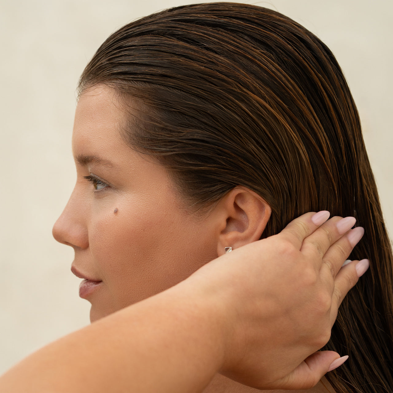Applying SilkGlide cream to hair